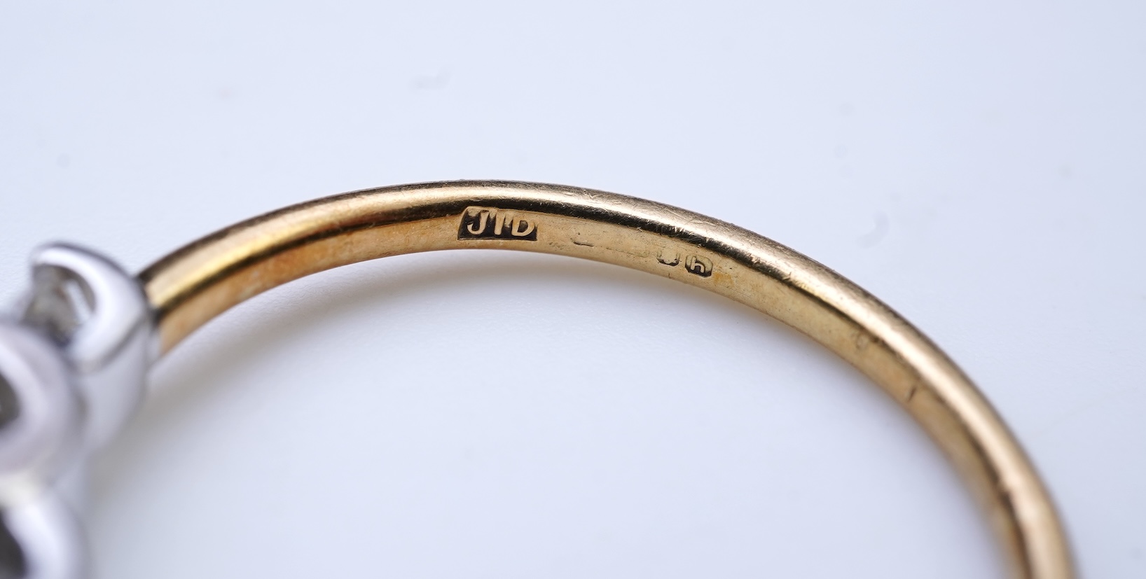 A three-stone diamond ring